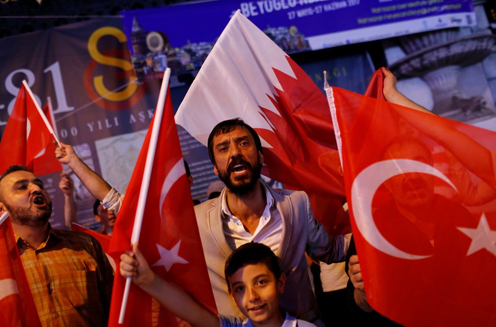 File picture of people shouting slogans as they hold Turkish and Qatari flags during a demonstration in favour of Qatar in central Istanbul, Turkey, late June 7, 2017. REUTERS/Murad Sezer

