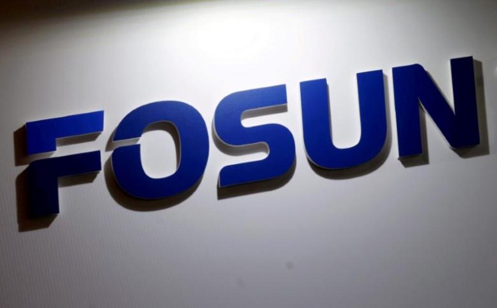 FILE PHOTO: A company logo of Fosun International is seen at the Fosun Fair held alongside the annual general meeting of the Chinese conglomerate in Hong Kong, China May 28, 2015. REUTERS/Bobby Yip/File Photo.