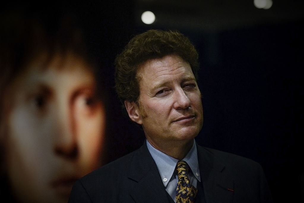 This picture taken on June 14, 2017 shows US art collector Tom Kaplan taking part in an interview at China's National Museum in Beijing. AFP / WANG Zhao