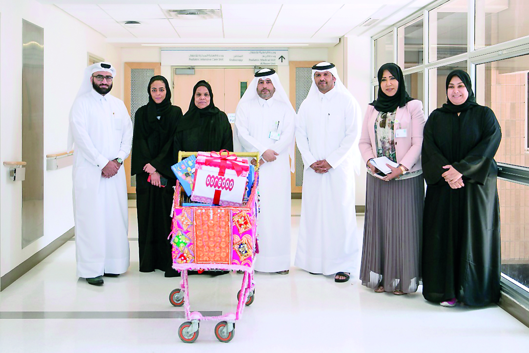 Officials from Ooredoo Group of companies visit children at Hamad Hospital as part of their activities to share the spirit of Ramadan, yesterday. 