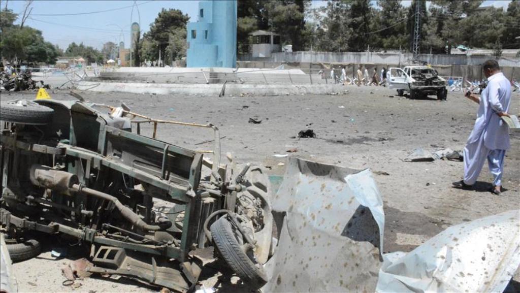 QUETTA, PAKISTAN - JUNE 23 : A wreckage of a car is seen as a Pakistani Security official inspects at the site of suicide bomb blast in Quetta, Pakistan on June 23, 2017. At least 12 people were killed and 16 injured in a suicide attack near the office of