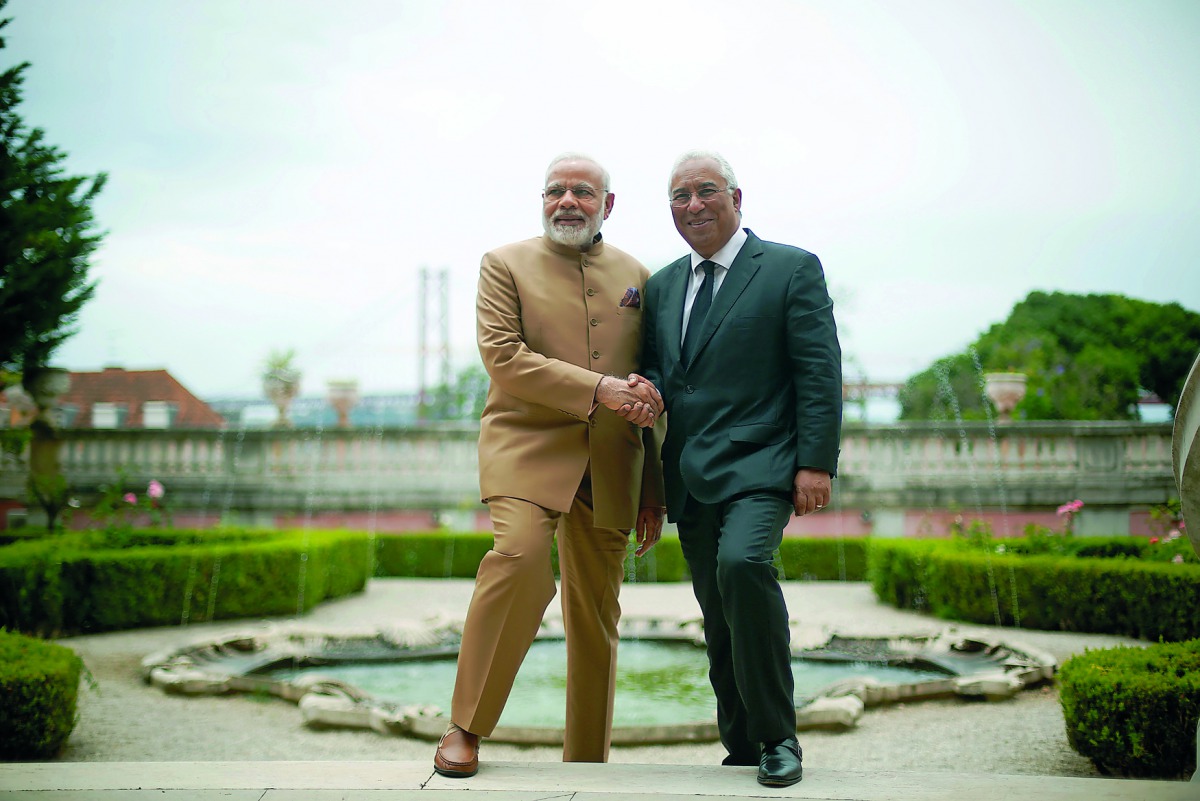 Indian Prime Minister Narendra Modi (left) shakes hands with his Portuguese counterpart Antonio Costa at the Necessidades Palace in Lisbon, Portugal, yesterday.