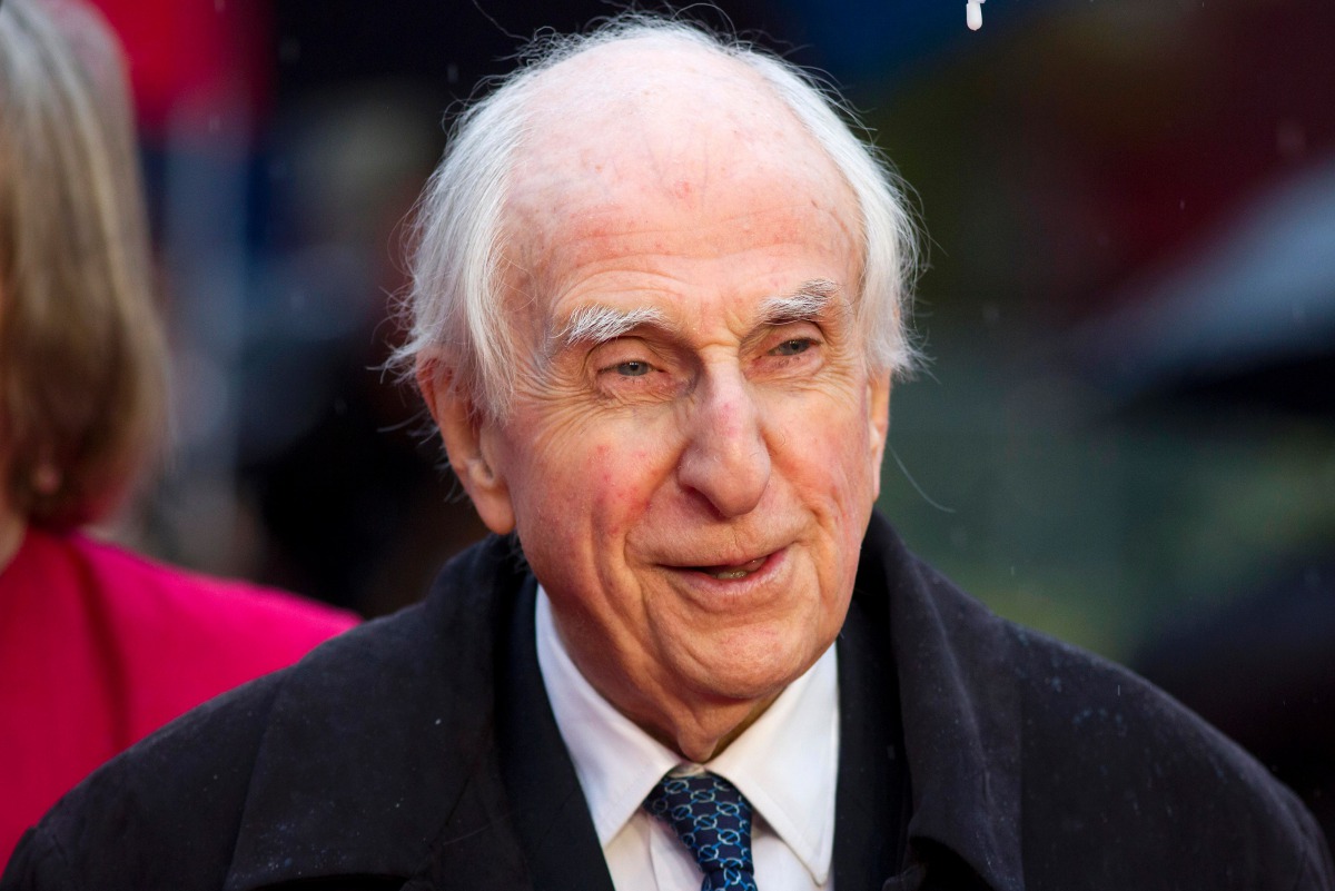 Michael Bond, the creator of Paddington the bear, posing for pictures on the red carpet upon arrival for the world premiere of 