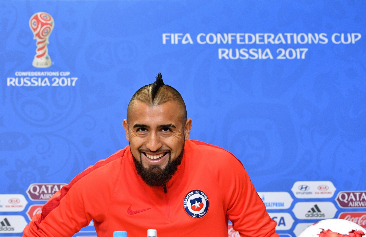 Chile's midfielder Arturo Vidal smiles during a press conference at Krestovsky Stadium in Saint Petersburg on July 1, 2017, the eve of Chile's 2017 FIFA Confederations Cup final match against Germany. (AFP / Mladen ANTONOV)