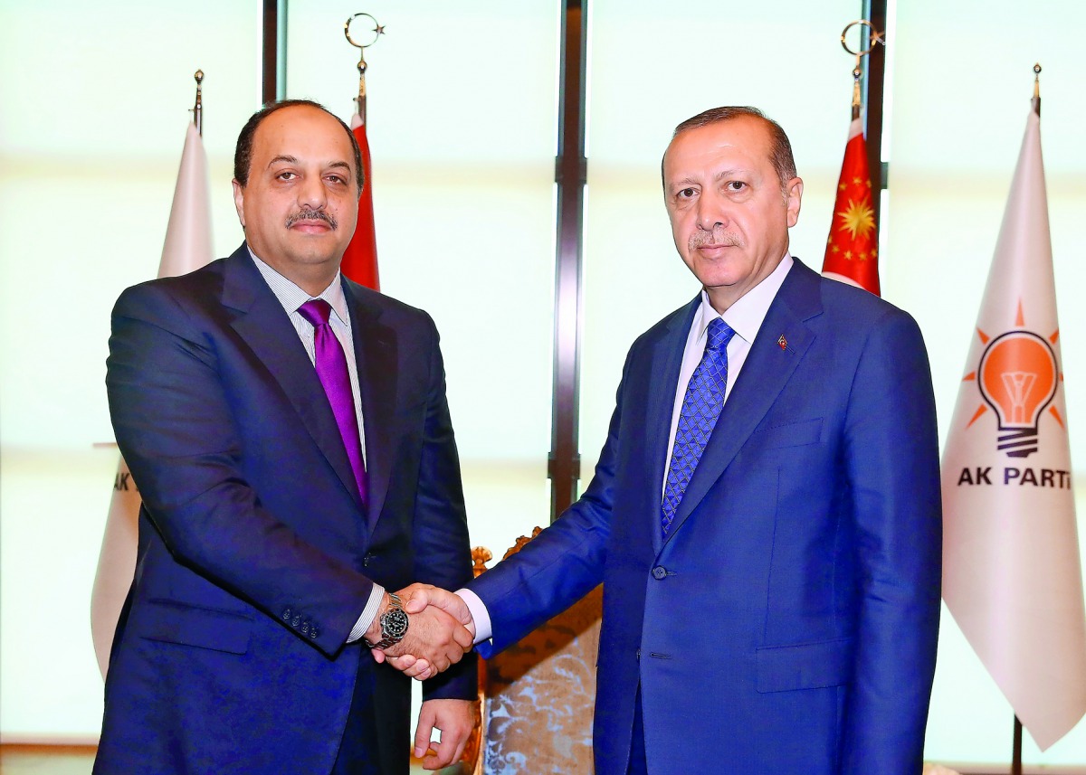 Minister of State for Defence, H E Dr Khalid bin Mohammed Al Attiyah, with Turkish President Recep Tayyip Erdogan in Ankara, yesterday.
