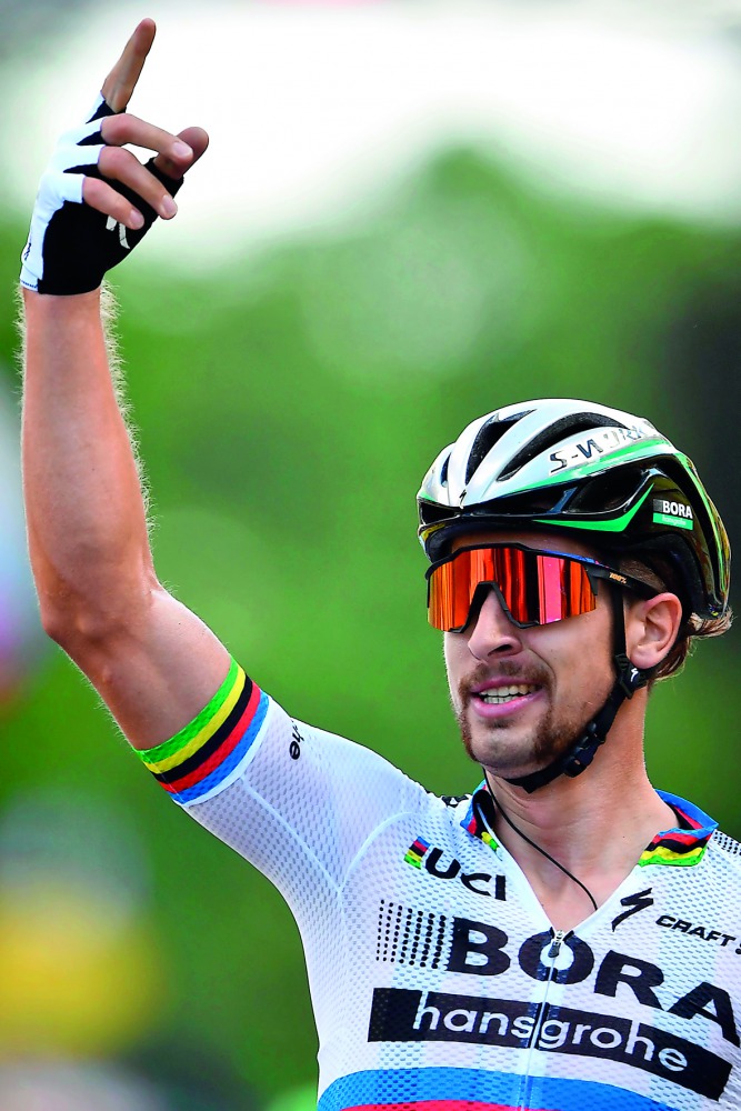Slovakia's Peter Sagan celebrates as he crosses the finish line at the end of the 212,5 km third stage of the 104th edition of the Tour de France cycling race between Verviers, Belgium and Longwy, France, yesterday.