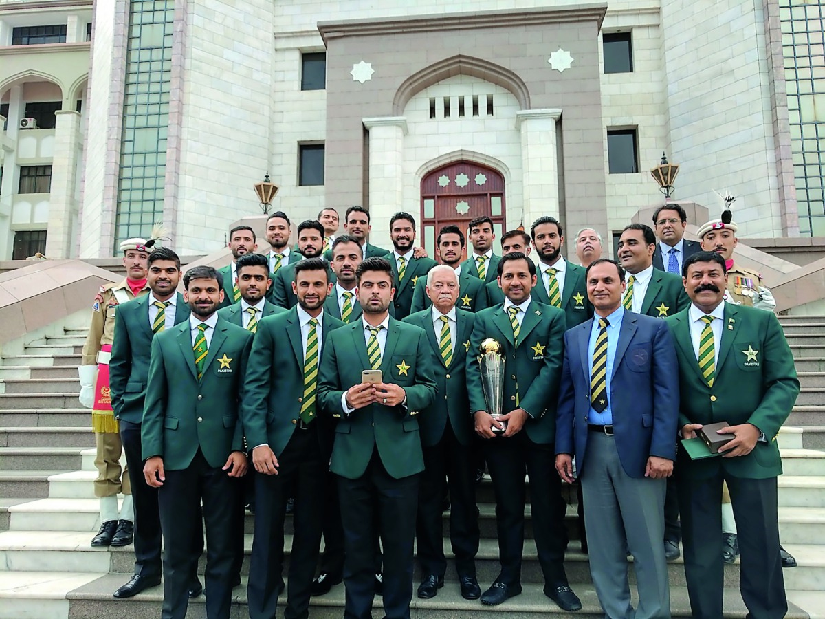 Players and officials of Pakistan cricket team, which won the Champions Trophy last month, pose for a group photo following a ceremony, honouring the national team hosted by Prime Minister Nawaz Sharif in Islamabad.  