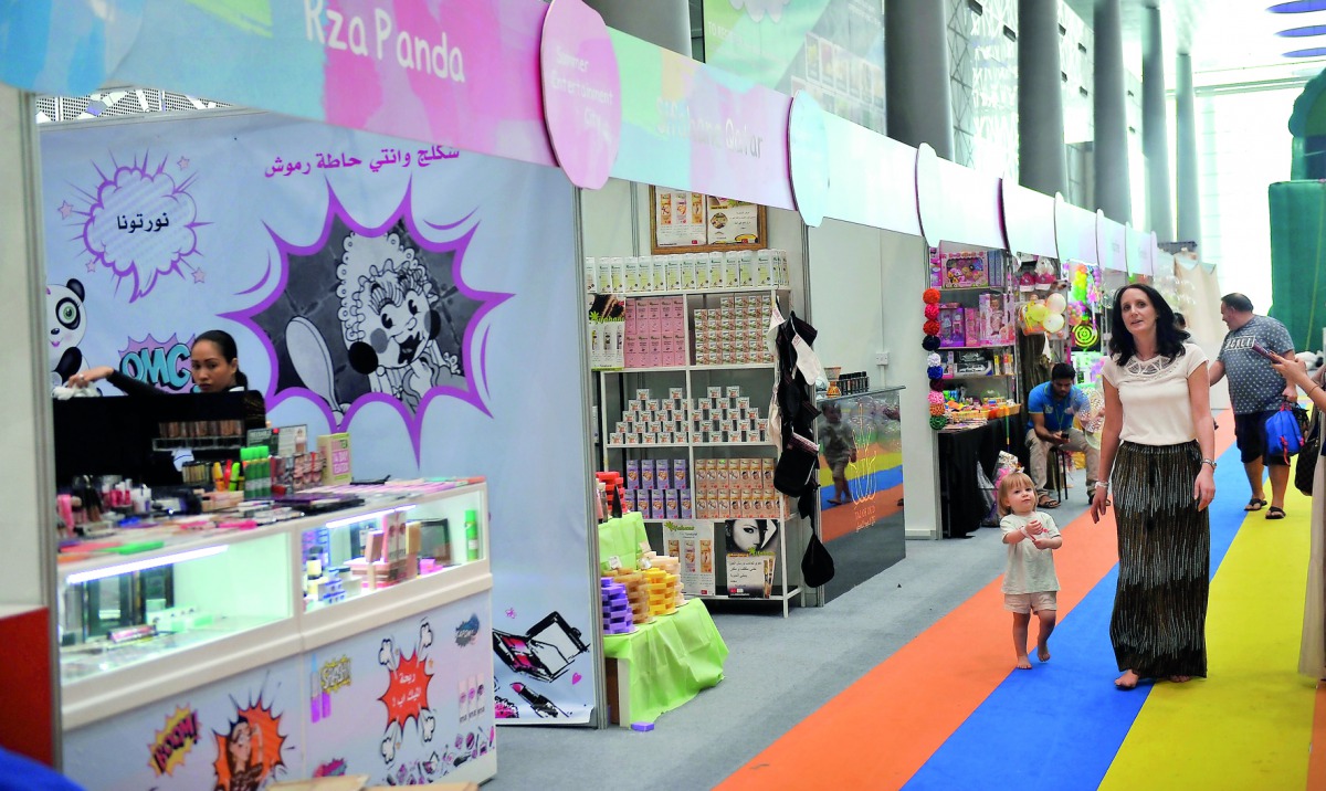 Stalls at the Entertainment City at the Doha Exhibition and Convention Center as part of Qatar Summer Festival, yesterday. Pic: Kammutty V P / The Peninsula