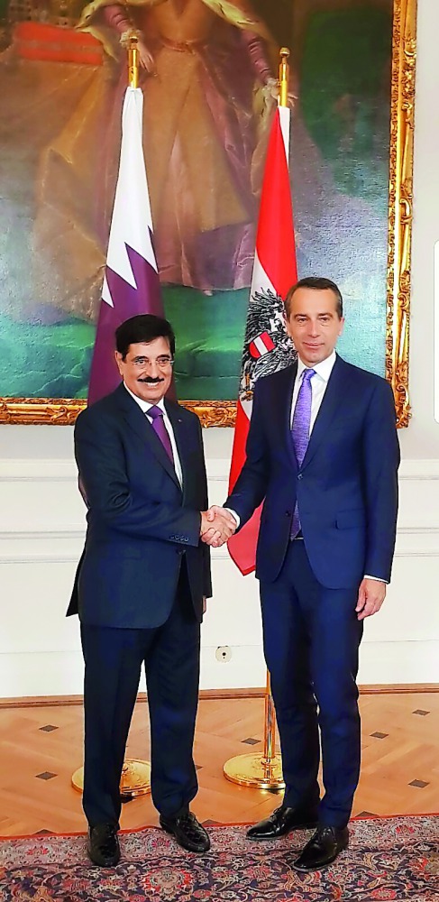 Adviser at the Emiri Diwan and Qatar's candidate for the Director-General post at the Unesco, H E Dr Hamad bin Abdulaziz Al Kawari, with Austrian Chancellor Christian Kern in Vienna, yesterday.
