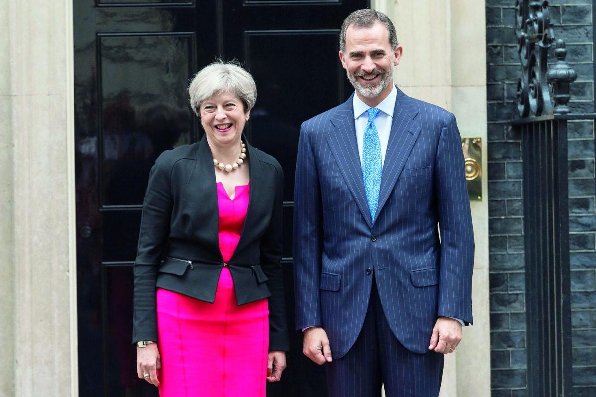 British Prime Minister Theresa May with King Felipe VI of Spain at 10 Downing Street in London, yesterday.
