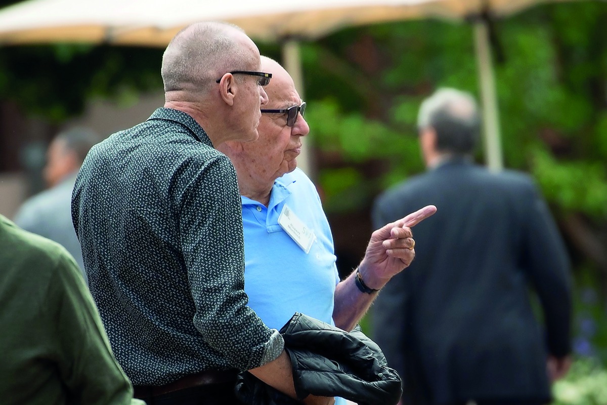 FROM LEFT: Robert Thompson, Chief Executive Officer of News Corp, and Rupert Murdoch, Executive Chairman of News Corp and Chairman of Fox News, attend the fourth day of the annual Allen & Company Sun Valley Conference, in Sun Valley, Idaho. Some of the wo