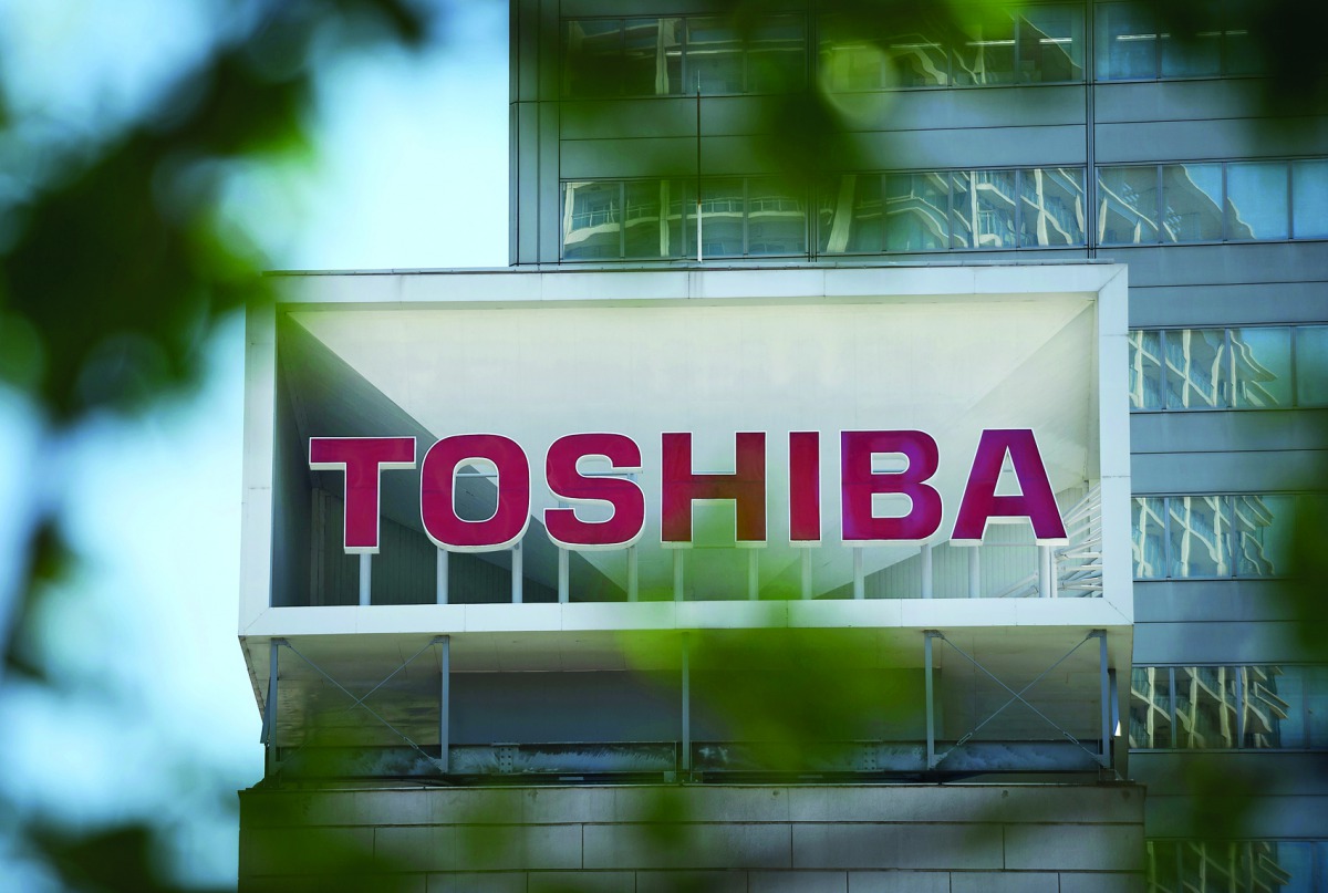 A Toshiba Corp. sign is displayed on the company's headquarters in Tokyo.