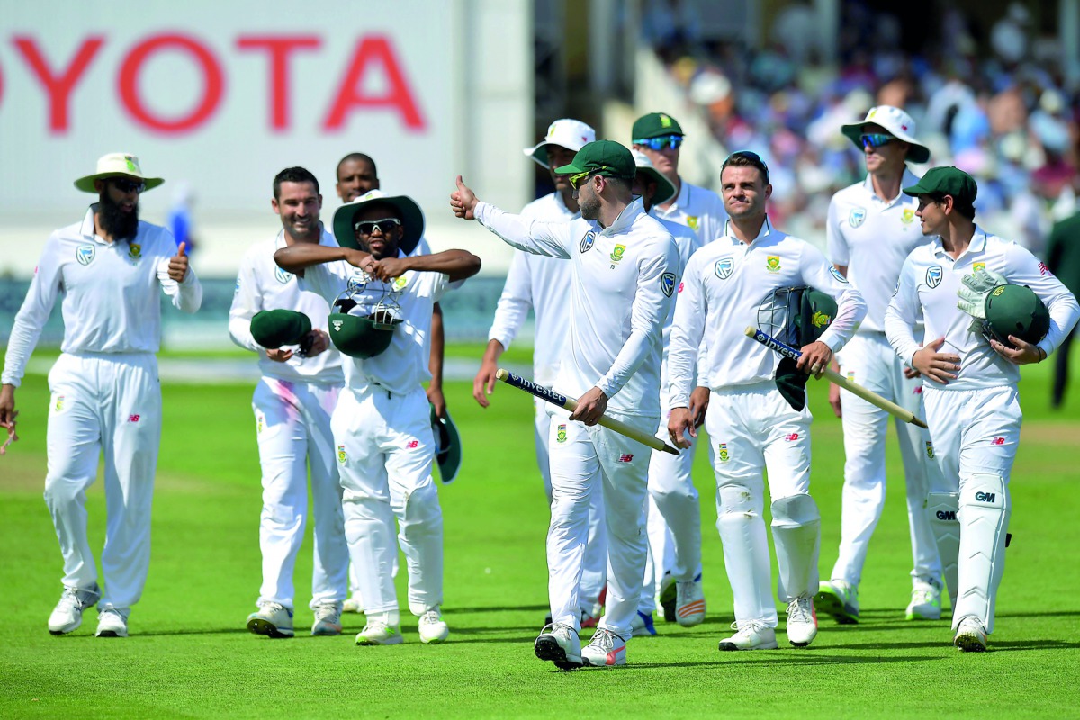 South Africa captain Faf du Plessis (centre) and South Africa’s players carry the stumps as they leave the field on the fourth day of the second Test match at Trent Bridge cricket ground in Nottingham, central England, yesterday.