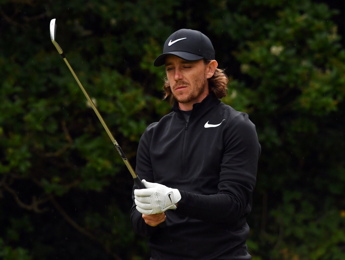 England's Tommy Fleetwood prepares to play his iron shot from the 5th tee during his second round on day two of the Open Golf Championship at Royal Birkdale golf course near Southport in north west England on July 21, 2017. (AFP / Ben STANSALL)