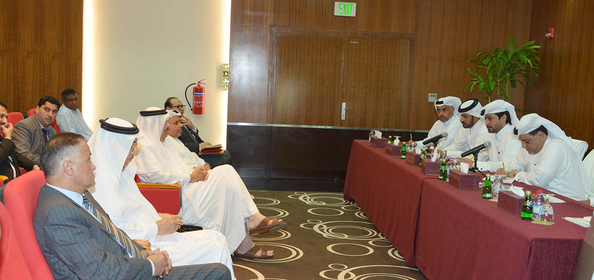 Qatar Chamber officials interacting with importers and other officials during the meeting.