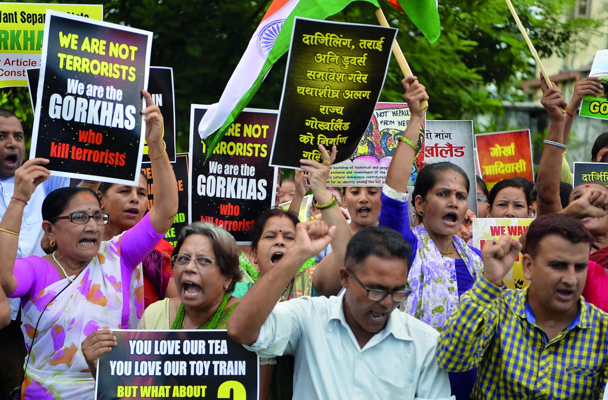 Gorkhaland Movement supporters chanting slogans during the 38th day of an indefinite strike in Darjeeling. 