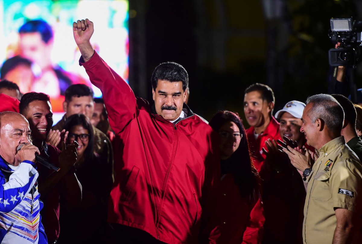 Venezuelan president Nicolas Maduro celebrates the results of 
