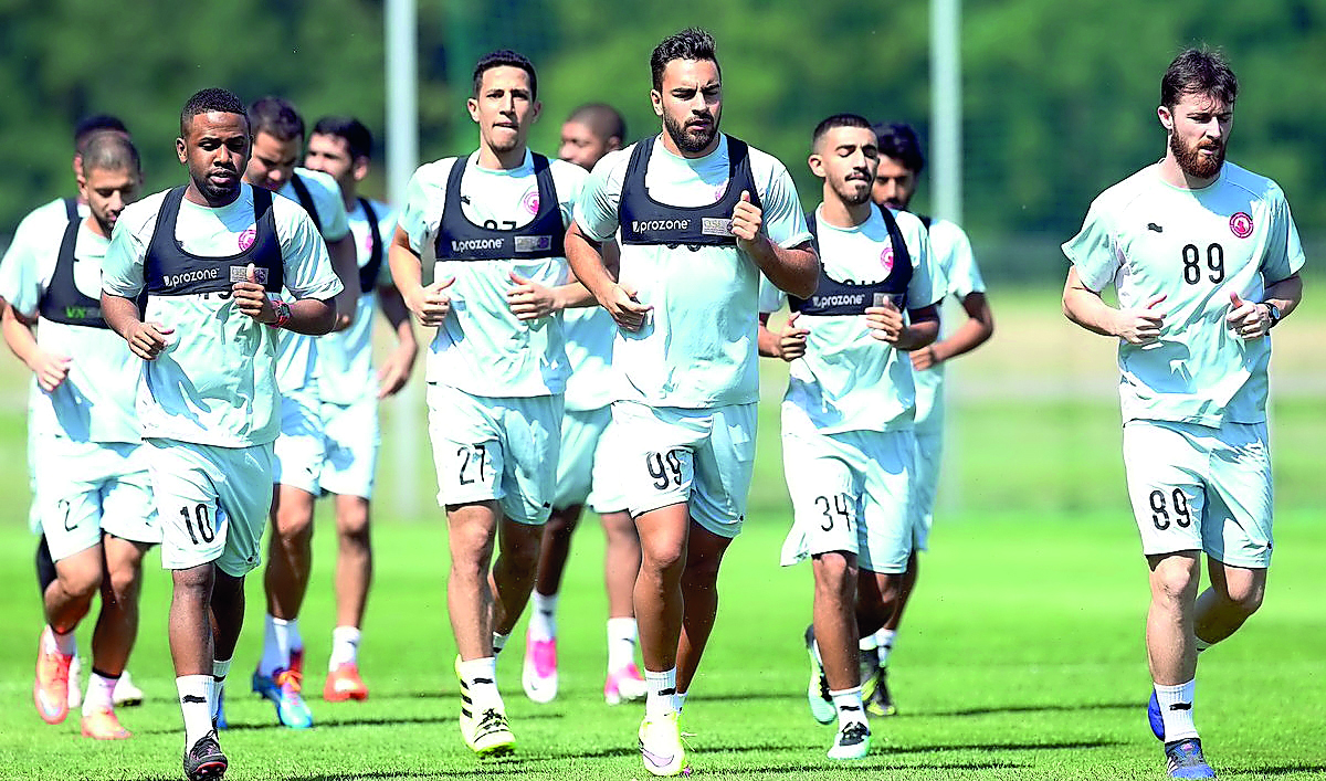 Al Arabi SC players pose for a photograph prior to their departure to Slovenia where they will attend a 25-day pre-season training camp as they step up preparations for Qatar Stars League 2017-2018 season.