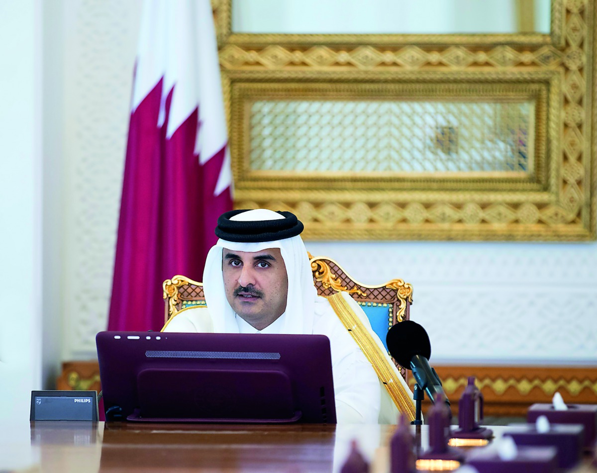 Emir H H Sheikh Tamim bin Hamad Al Thani addressing the Cabinet meeting at the Emiri Diwan premises yesterday.