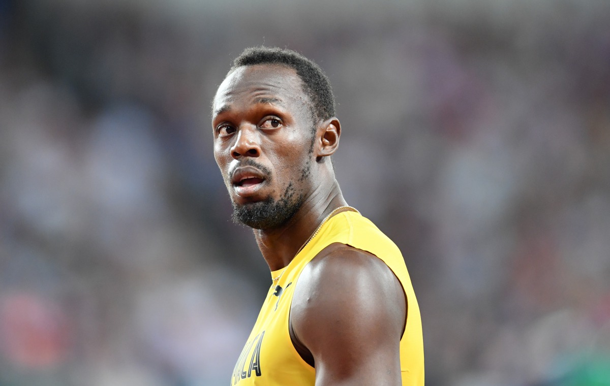 Usain Bolt of Jamaica gestures during the 