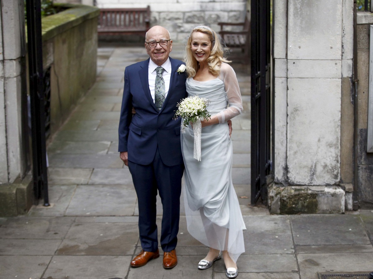 FILE PHOTO: Media Mogul Rupert Murdoch and former supermodel Jerry Hall outside St Bride's church following a service to celebrate their wedding which took place on Friday, in London, Britain March 5, 2016. Reuters / Peter Nicholls