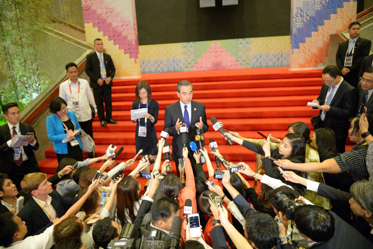 China's Foreign Minister Wang Yi speaks during a press conference on the sidelines of the 50th Association of Southeast Asian Nations (ASEAN) regional security forum in suburban Manila on August 6, 2017. (AFP / TED ALJIBE)