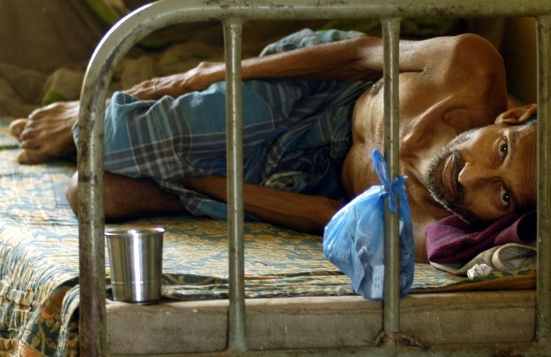 A patient suffering from Tuberculosis rests inside a hospital in Agartala, capital of India’s northeastern state of Tripura, March 24, 2009.  Reuters/Jayanta Dey