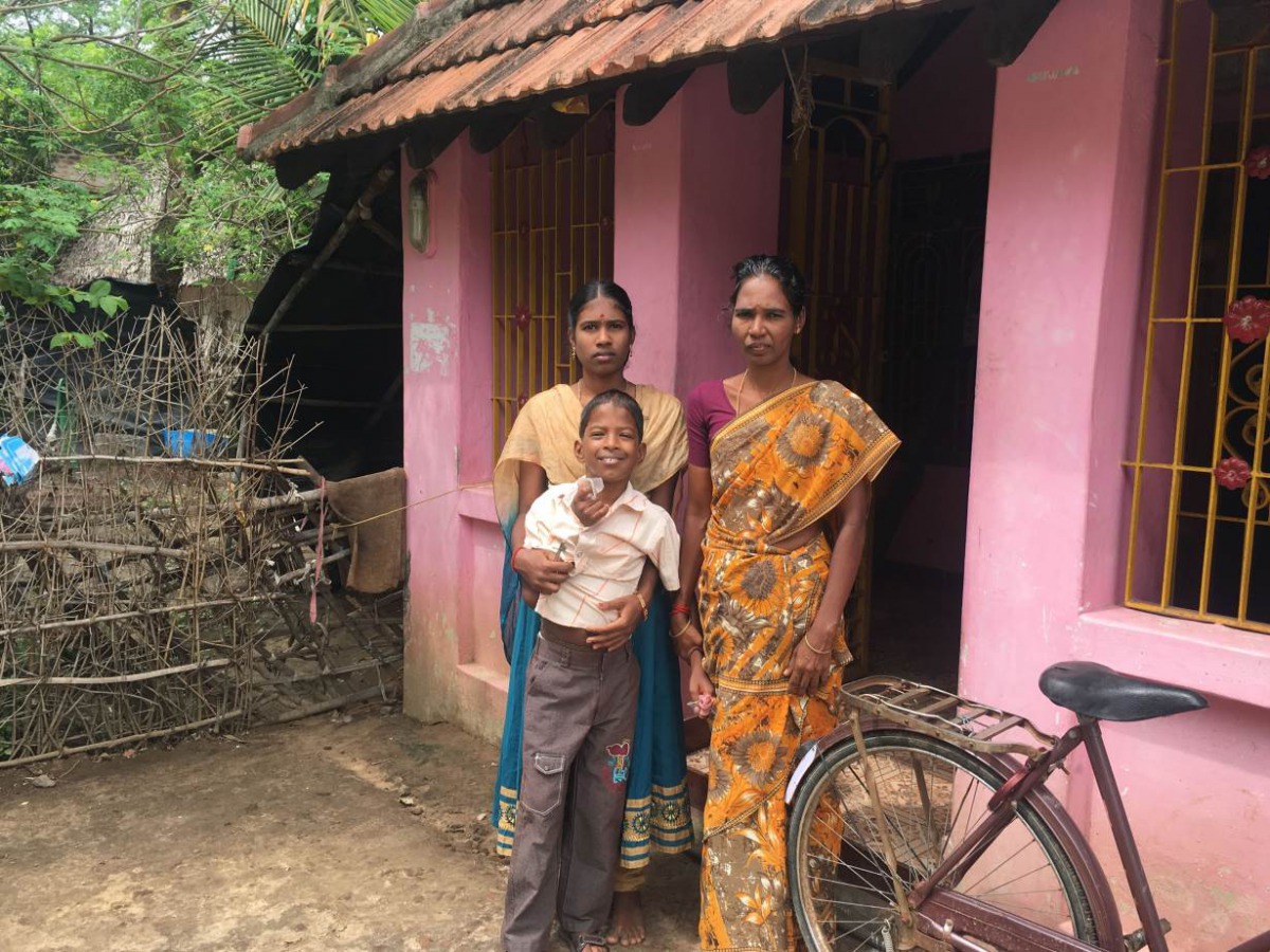 Kavita stands with her youngest daughter outside their home after her husband, a landless farmer, died last year when the crops failed amidst the worst drought in more than a century in Nagapattinam, India. July 7, 2017. Thomson Reuters Foundation/Rina Ch