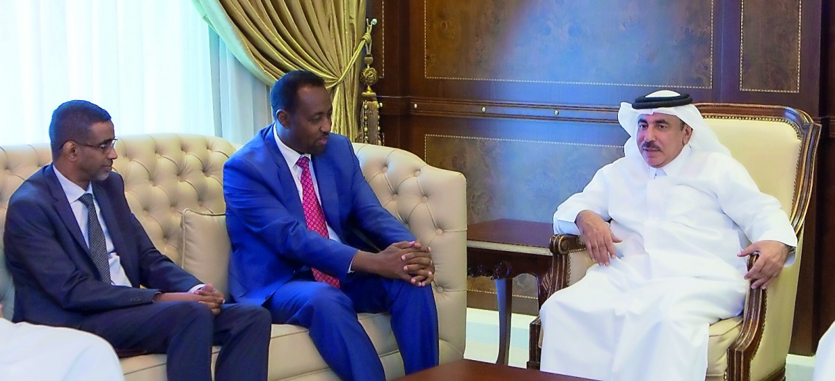 Minister of Transport and Communications H E Jassim bin Saif Al Sulaiti, with Bishar Hussein, Director-General of the Universal Postal Union (UPU), in Doha, yesterday. The meeting was attended by  Mohammed Ali Al Mannai, President of the Communications Re