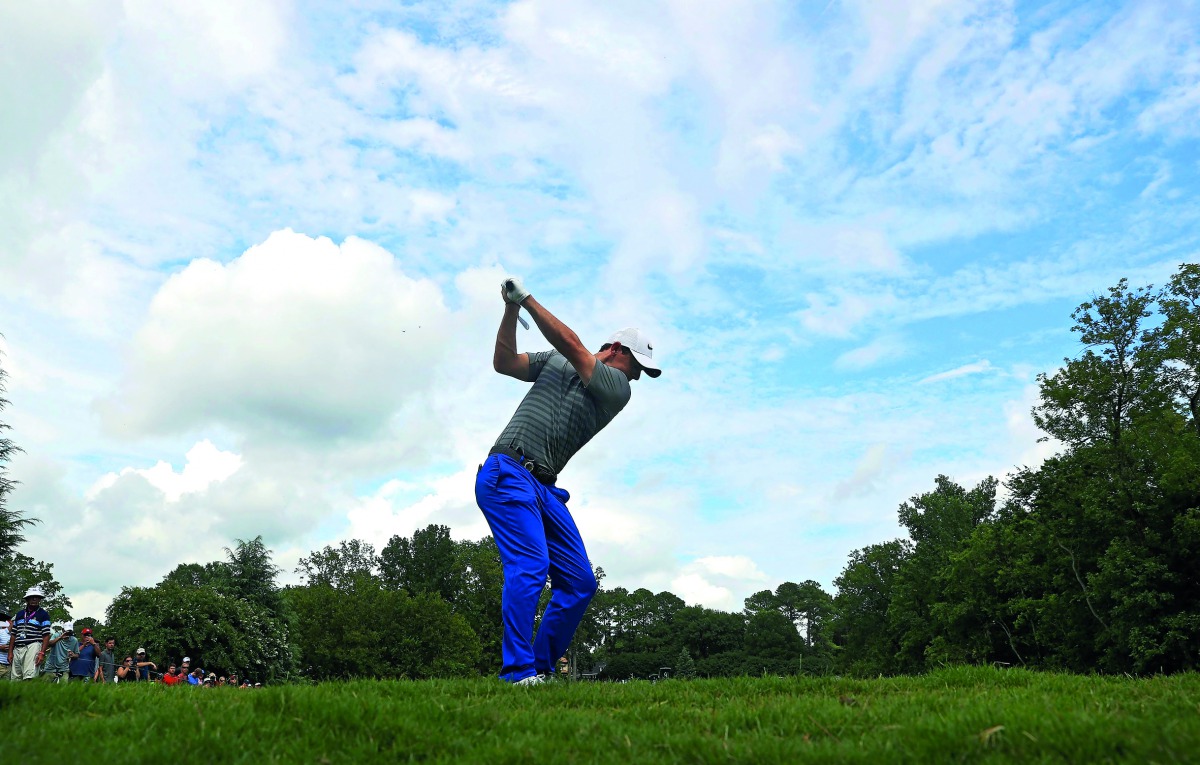 Rory McIlroy of Northern Ireland plays his shot during a practice round prior to the 2017 PGA Championship at Quail Hollow Club in Charlotte, North Carolina on Tuesday.