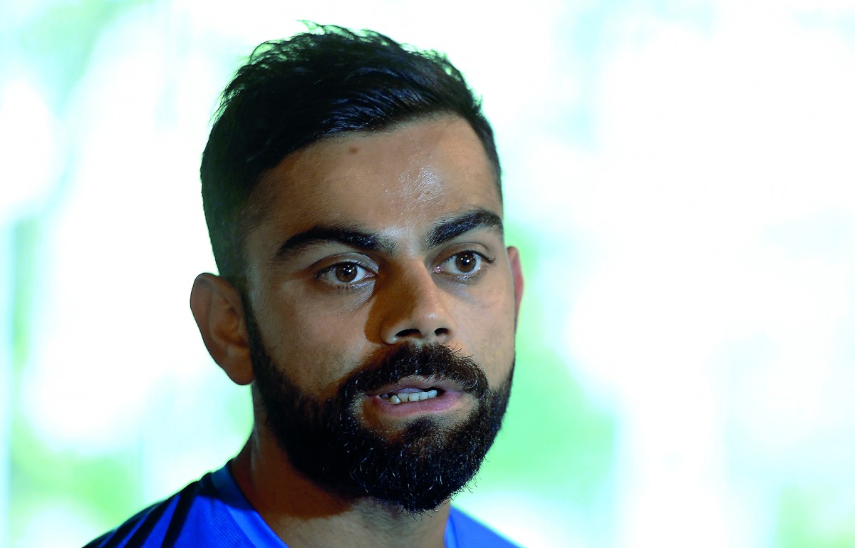 Indian captain Virat Kohli talks to reporters in Pallekele