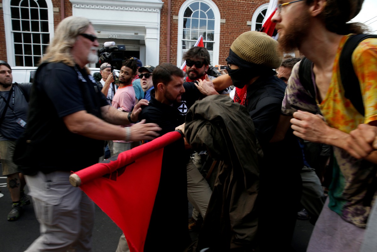 White supremacists clash with counter protesters during a rally in Charlottesville, Virginia, U.S., August 12, 2017. Reuters/Joshua Roberts