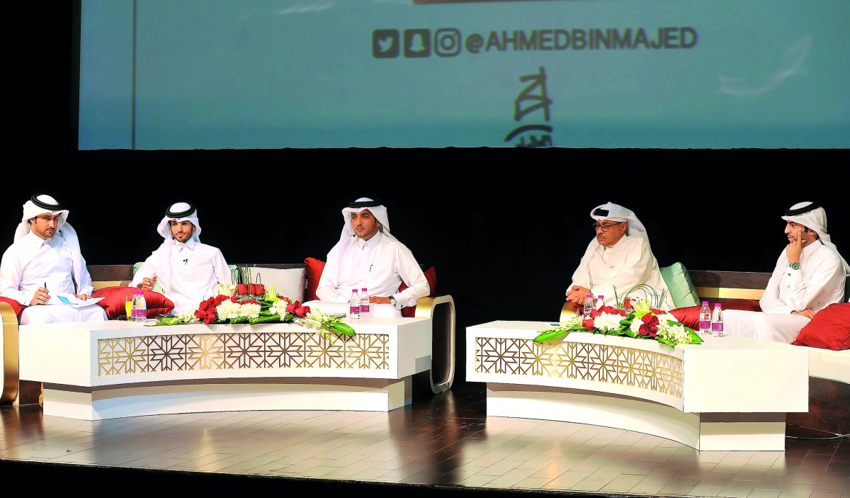 Qatari artist Ahmed bin Majed Al Maadheed (second left) Prominent Artist Nasser Al Mughaiseb (centre), Ghanem Al Sulaiti (second right) and other officials at the event. Pic: Kammutty VP / The Peninsula