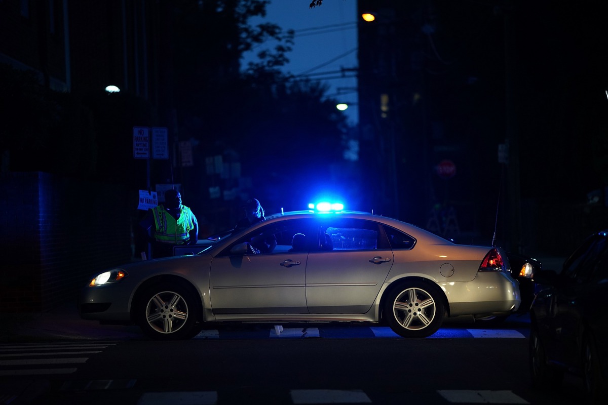 Police block streets near the location were a woman was killed and multiple people were injured when a car plowed into a crowd of anti-fascist counter-demonstrators marching near a downtown shopping area August 12, 2017 in Charlottesville, Virginia.Win Mc