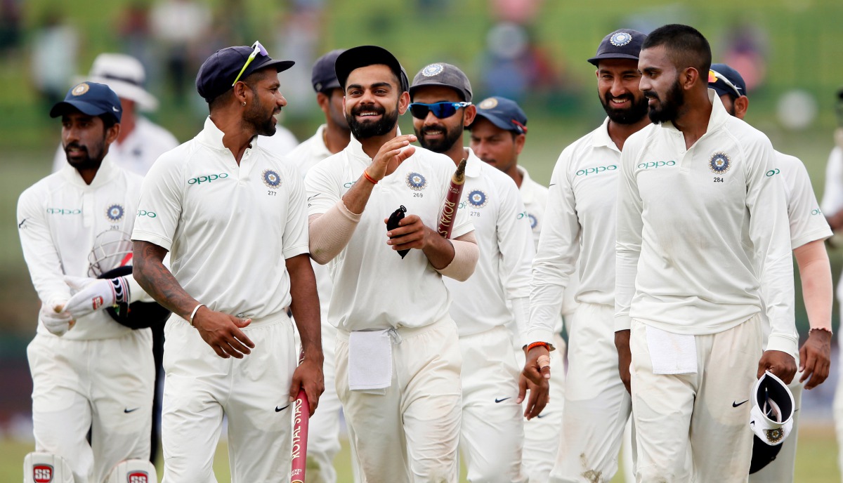 India's captain Virat Kohli celebrates with his teammates after they won the match and the test cricket series against Sri Lanka. (REUTERS/Dinuka Liyanawatte)