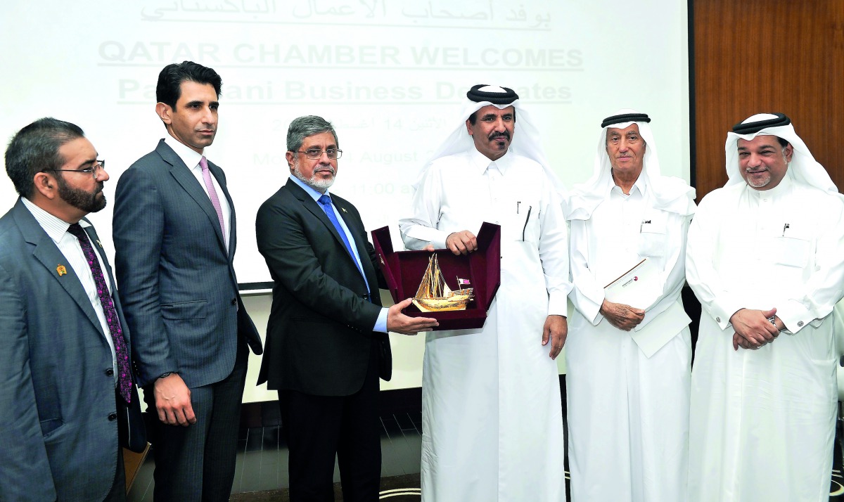 FPCCI President Zubair F Tufail (second left), receiving a memento from Qatar Chamber Vice-Chairman Mohammed bin Ahmed bin Towar Al Kuwari (centre) along with Pakistan Ambassador Shahzad Ahmad (left), Al Darwish United Group Chairman Yousuf bin Jassim Al 