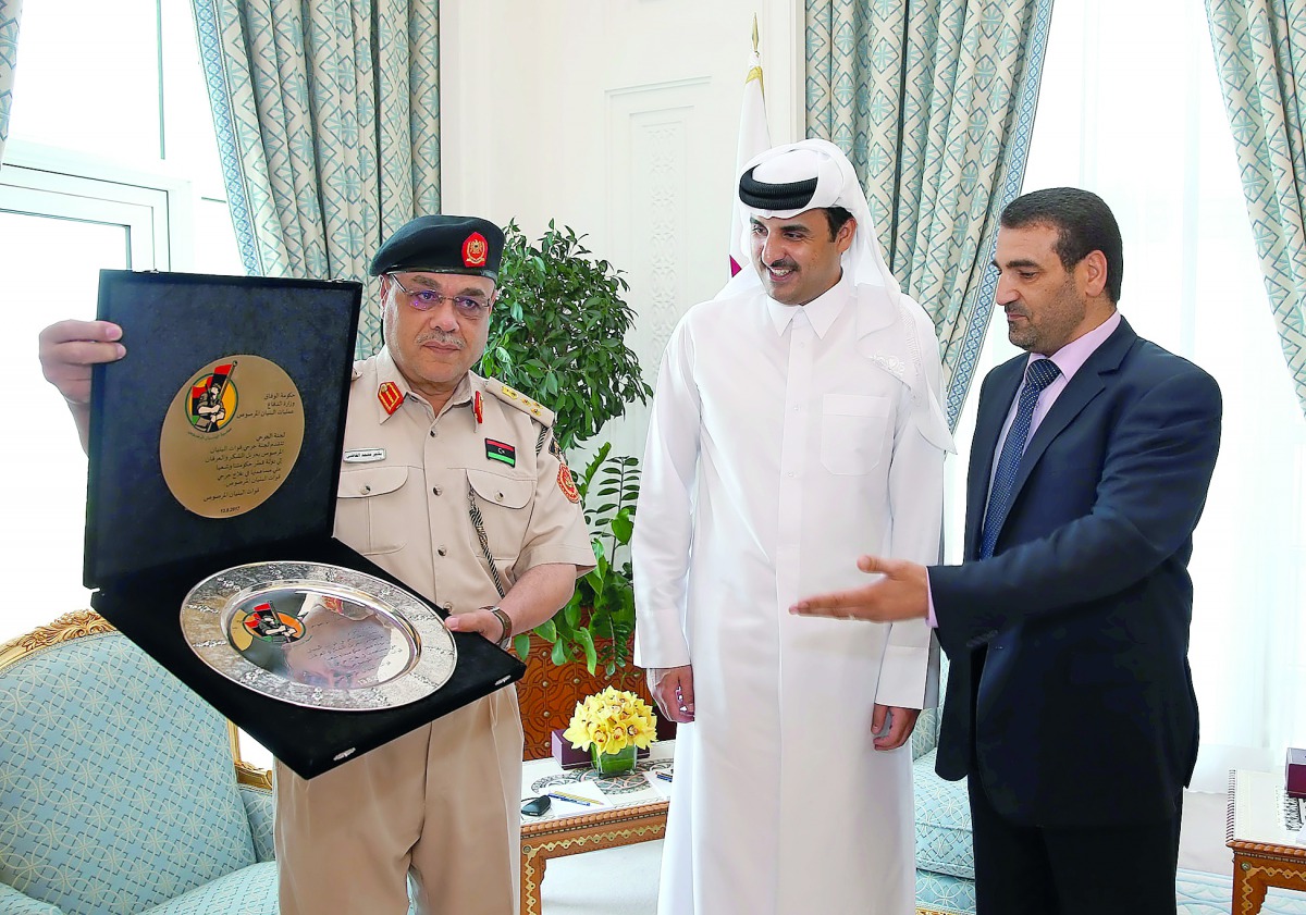 Emir H H Sheikh Tamim bin Hamad Al Thani met yesterday at the Emiri Diwan with a delegation comprising members of Al Bunyan Al Marsous forces in the fraternal country of Libya, who called upon the Emir to greet him on the occasion of their visit to Qatar.