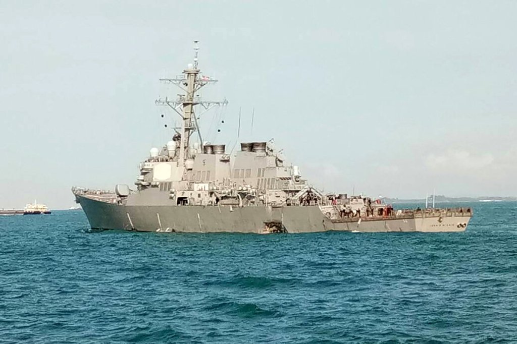 The John S. McCain, a guided-missile destroyer, seen after a collision, near Johor, Malaysia, on Monday. / Reuters.
