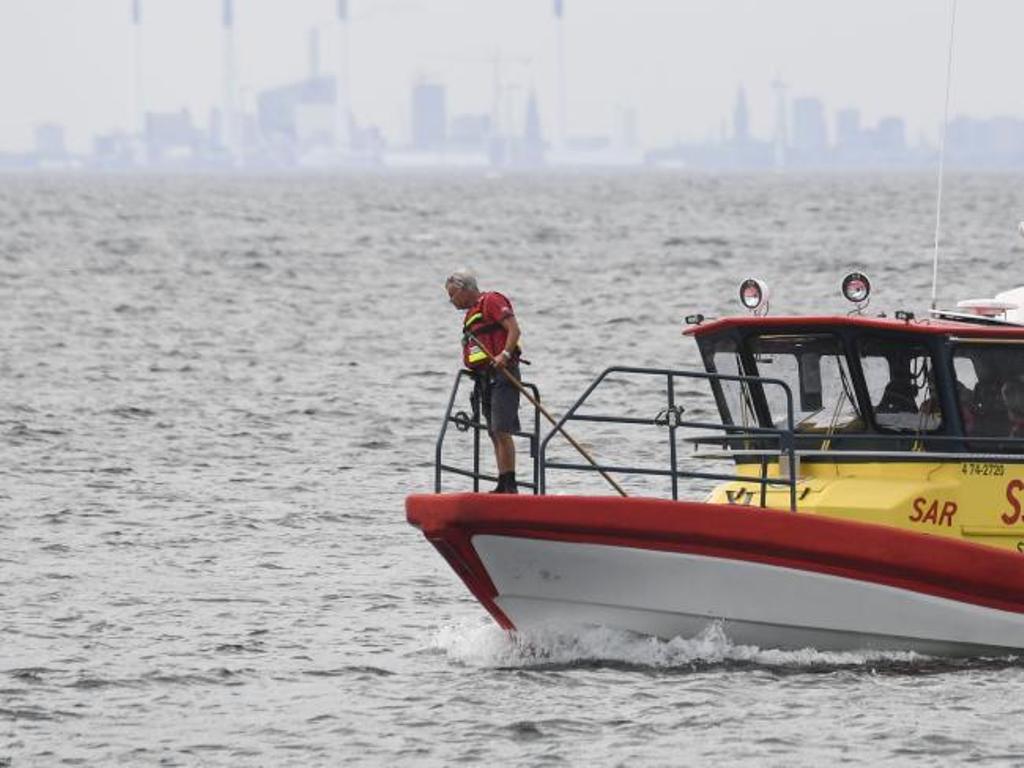 A unit of the Swedish Sea Rescue Society searches for the missing Swedish journalist Kim Wall, at the Lundakra Bay between Barsebaeck and Landskrona on August 15, 2017. Picture: Johan NILSSON / Sweden OUTSource:AFP.
