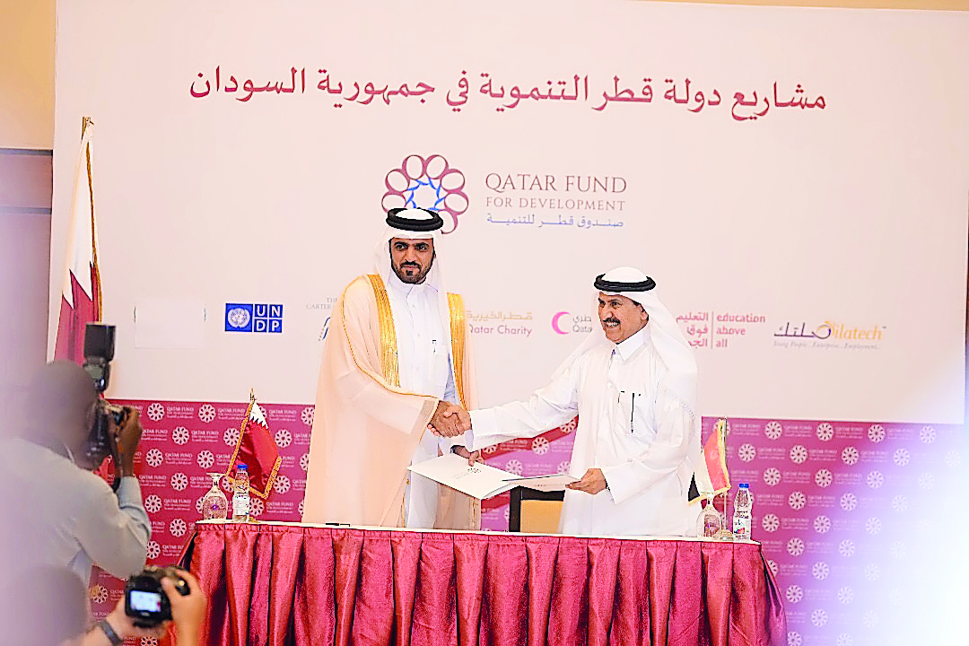 QFFD General Manager, Khalifa Jassim Al Kuwari, and QRCS Secretary-General, Ali Hassan Al Hammadi, during the MoU signing ceremony. 
