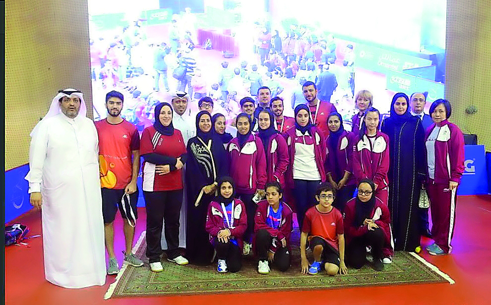 Qatar table tennis team poses for a picture with officials of Qatar Table Tennis Association on their return to Doha on Tuesday.
