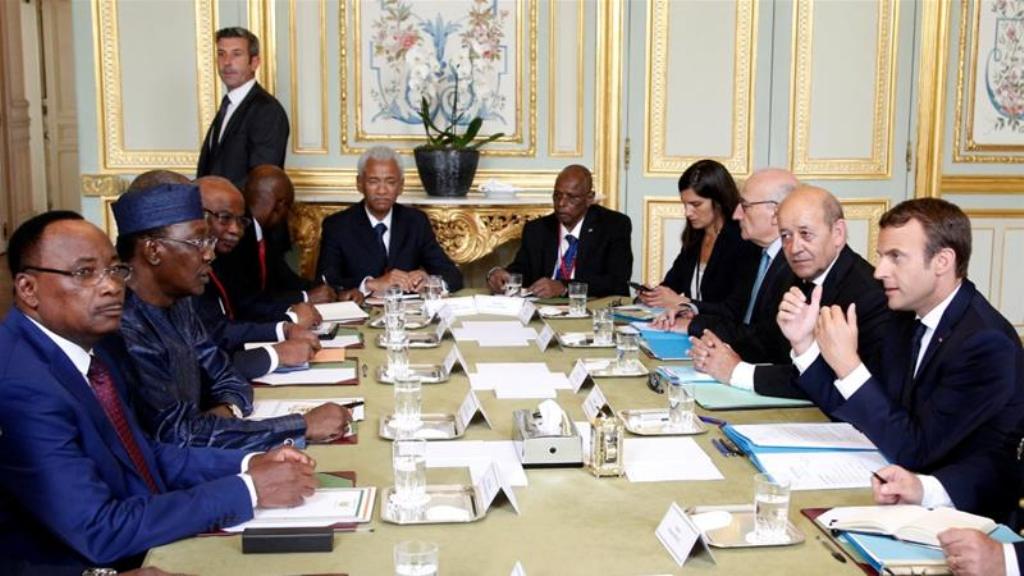 Leaders at the Paris summit will focus on the central Mediterranean route [Thibault Camus/Reuters].