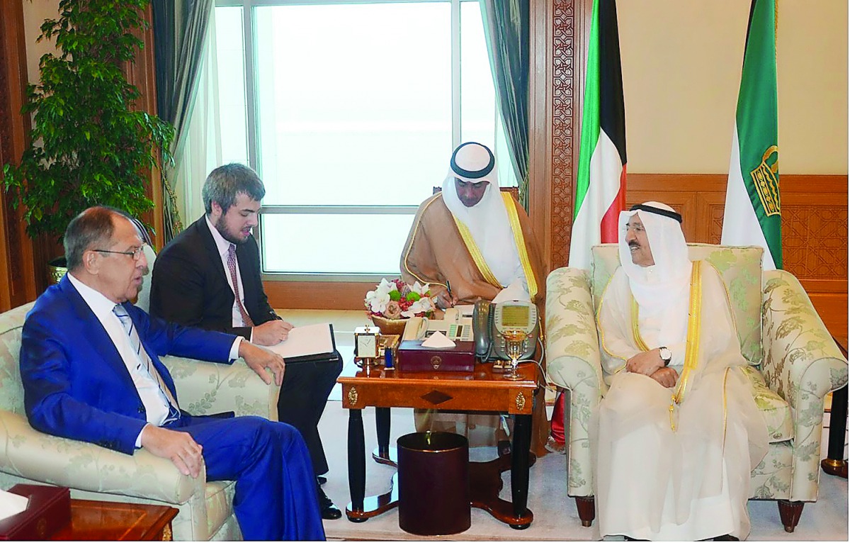 Emir of Kuwait, H H Sheikh Sabah Al Ahmad Al Jaber Al Sabah, with Russian Foreign Minister Sergei Lavrov in Kuwait yesterday. 
