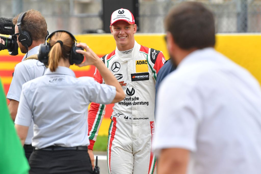  Mick Schumacher, German racing driver and son of seven-time Formula One champion Michael Schumacher, gives an interview after driving a Benetton B194 car during demonstration laps on the occasion of Michael Schumacher's 25th first Formula One victory, at