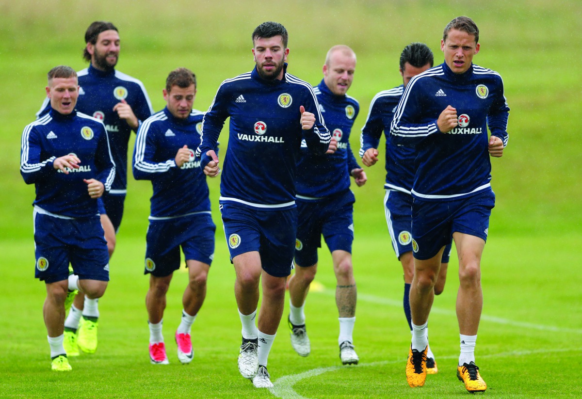 Scotland players during a training session ahead of the 2018 World Cup qualifying match at Bishopton, Britain on Monday.