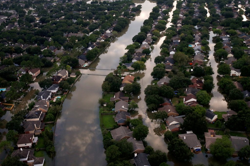 Houses are seen partially submerged in flood waters caused by Tropical Storm Harvey in Northwest Houston, Texas, U.S. August 30, 2017. Picture taken August 30, 2017. REUTERS/Adrees Latif
