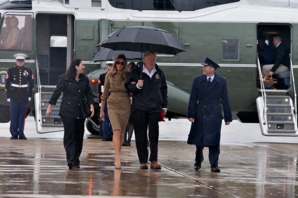 US President Donald Trump and First Lady Melania Trump board Air Force One on September 2, 2017, at Andrews Air Force Base in Maryland. The Trumps are traveling to Texas and Lousiana to assess conditions in the storm-ravaged states. (AFP / Nicholas Kamm)