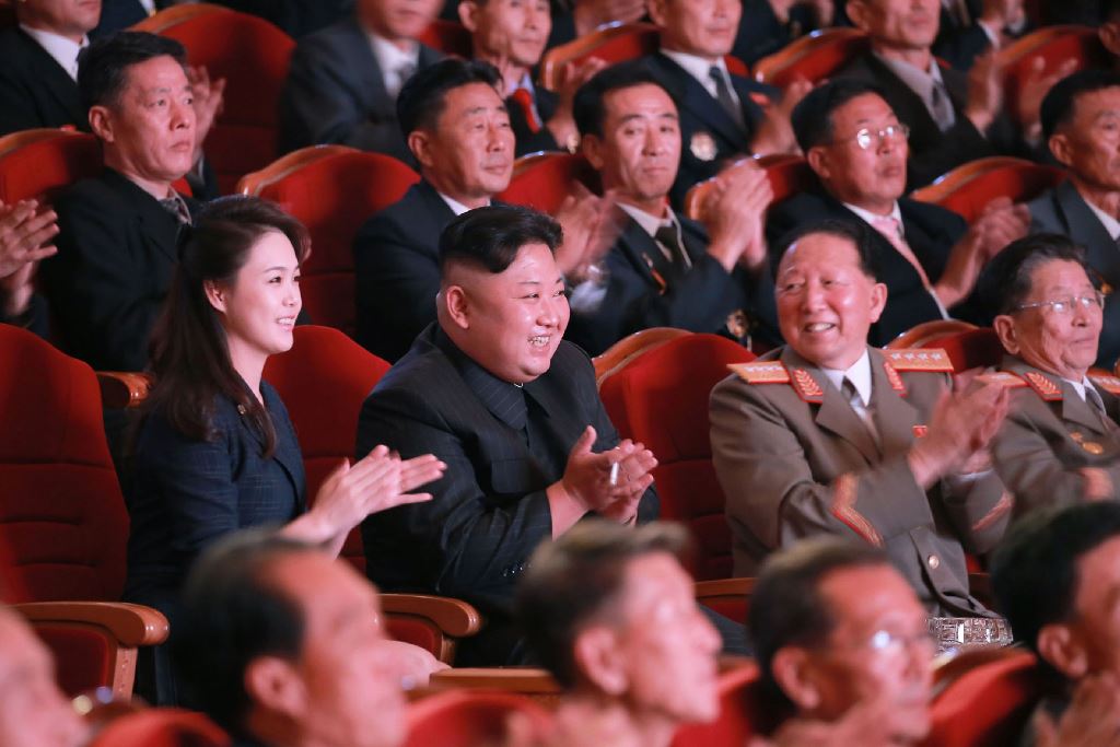 This undated picture released by North Korea's official Korean Central News Agency (KCNA) on September 10, 2017 shows North Korean leader Kim Jong-Un (centre row 2nd L) and his wife Ri Sol-Ju (centre row L) attending an art performance dedicated to nuclea