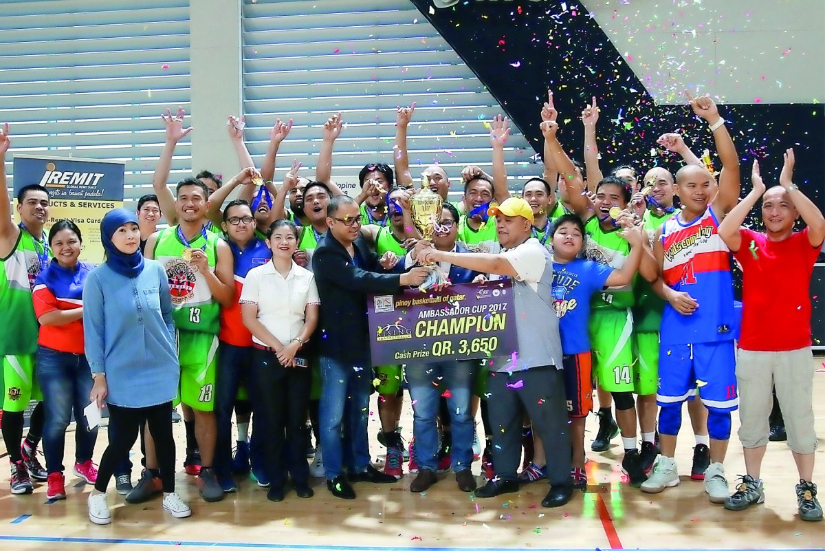 Doha Desert, winners of the PIBAQ Rising Division Championship pose for a picture with officials during the awards ceremony.