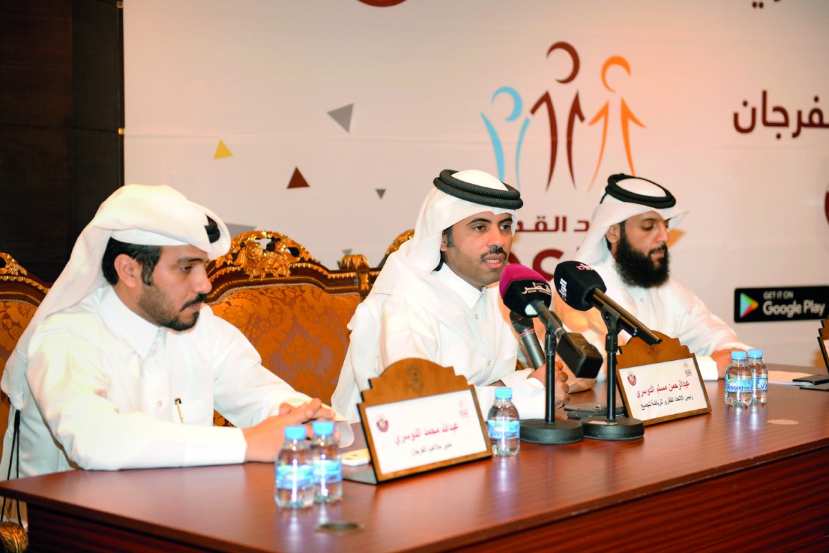 From left: Abullah Al Dosari, Head of Farjan Pitches, Abdul Rahman Al Dosari, President of QSFA, and Ahmed Al Ajmi, CEO of QSFA, at the press conference held at the Ministry of Culture and Sports.